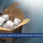 A box of dry ice cubes emitting vapor.